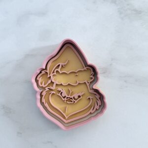 Grinch 3, wysokość 8,5 cm, szerokość 6 cm – z tłoczeniem